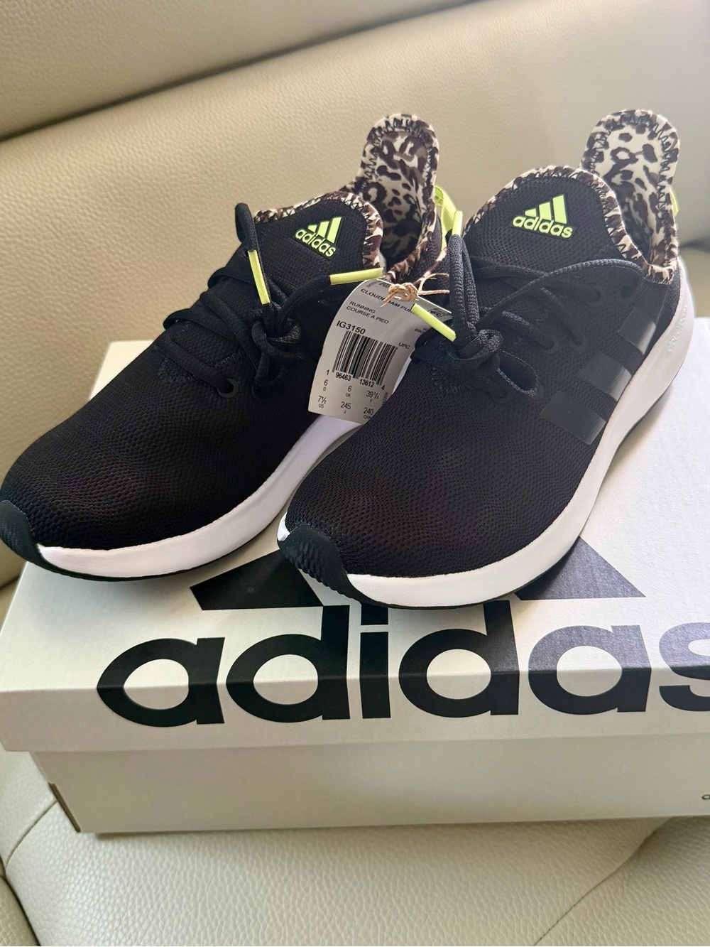 adidas Women’s Black Sneakers with Neon Green Accents and Leopard Collar